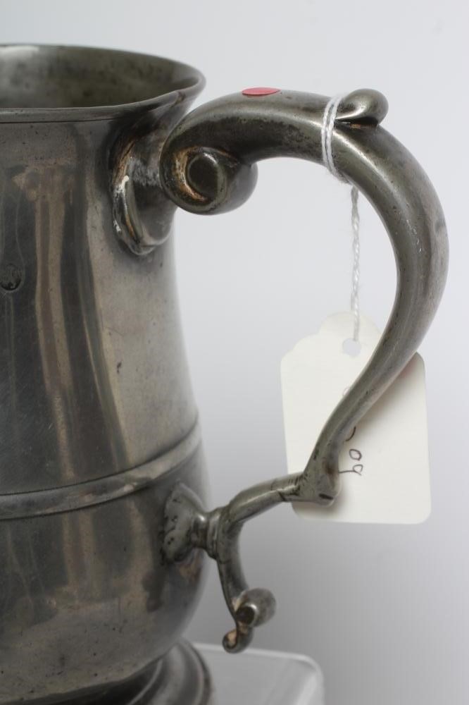 A GROUP OF FIVE PEWTER QUART REEDED MUGS, 19th century, one straight sided, the others of tulip form Image