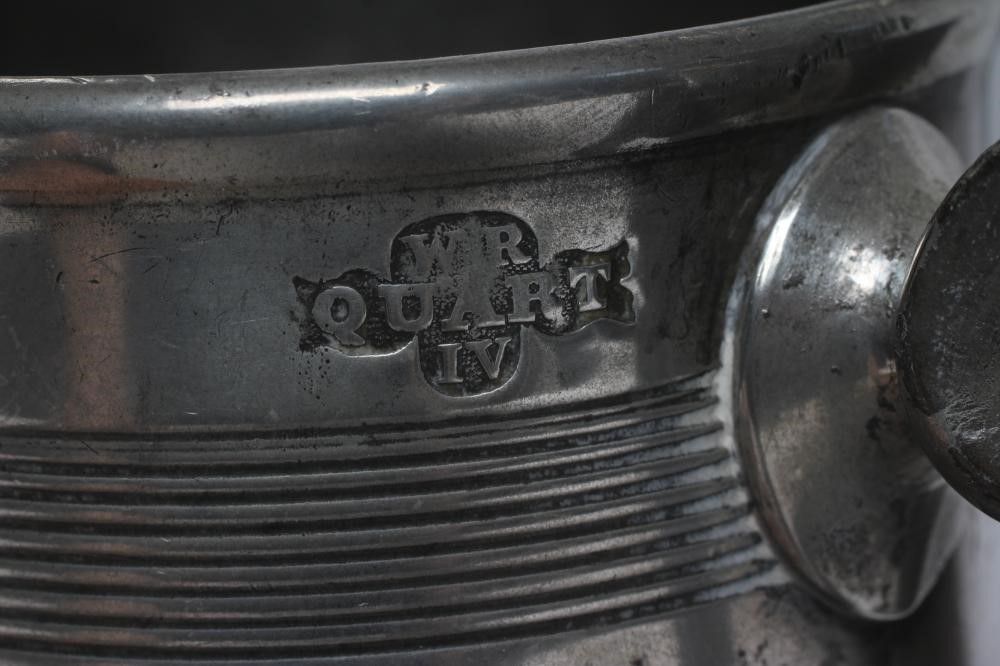 A GROUP OF FIVE PEWTER QUART REEDED MUGS, 19th century, one straight sided, the others of tulip form Image