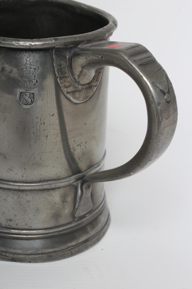 A GROUP OF FIVE PEWTER QUART REEDED MUGS, 19th century, one straight sided, the others of tulip form Image