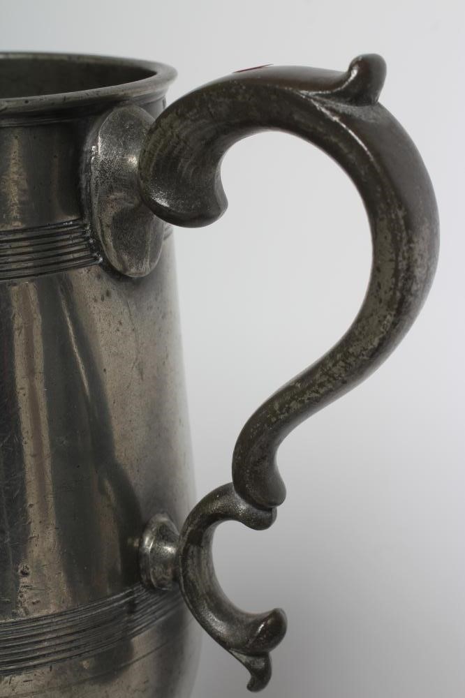 A GROUP OF FIVE PEWTER QUART REEDED MUGS, 19th century, one straight sided, the others of tulip form Image