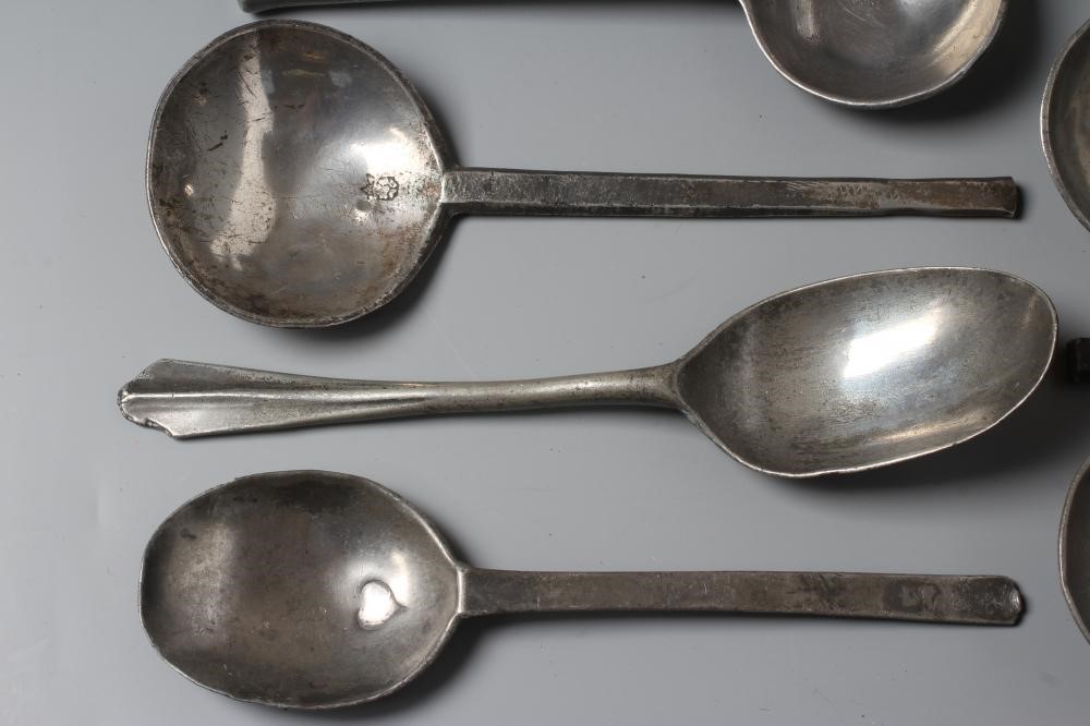 EIGHT VARIOUS SLIP TOP PEWTER SPOONS Image