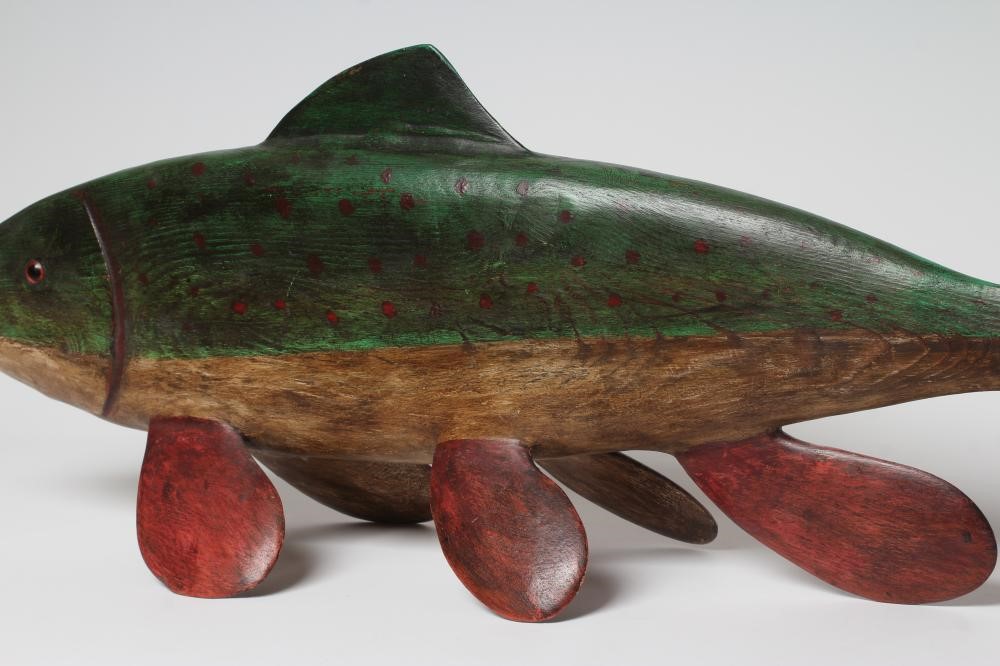 GUY TAPLIN (b.1939) a carved and painted model of a fish with inset amber eyes, signed, 40 x 14 Image