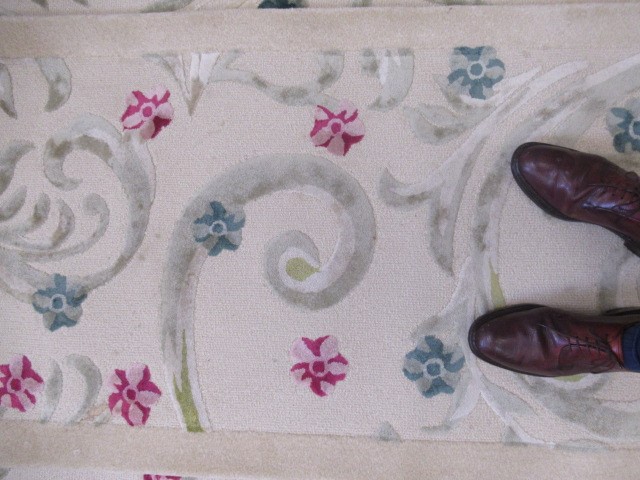 A BESPOKE WOOL RUNNER to match the previous lot, 23' 8" x 2' 6 1/2" (Est. plus 24% premium inc. VAT) Image