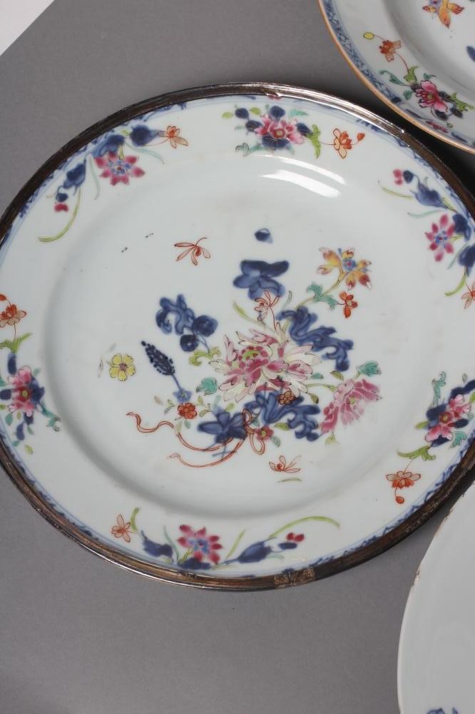 A PAIR OF CHINESE PORCELAIN SOUP PLATES AND A MATCHING PLATE painted in underglaze blue and over Image