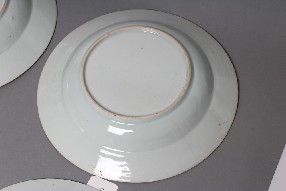 A PAIR OF CHINESE PORCELAIN SOUP PLATES AND A MATCHING PLATE painted in underglaze blue and over Image