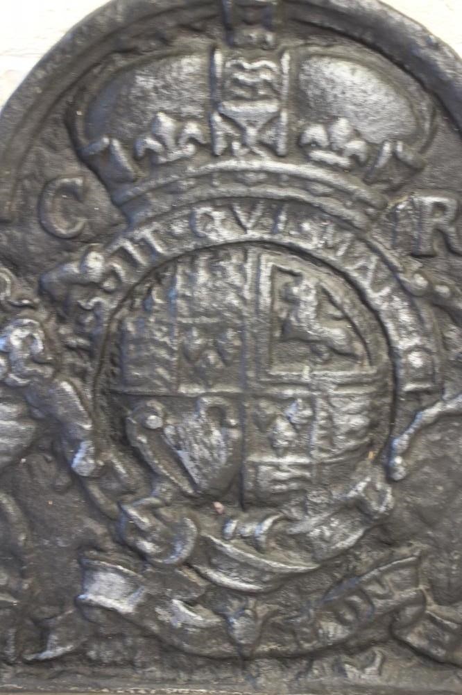 AN EARLY GEORGIAN STYLE CAST IRON FIREBACK Image