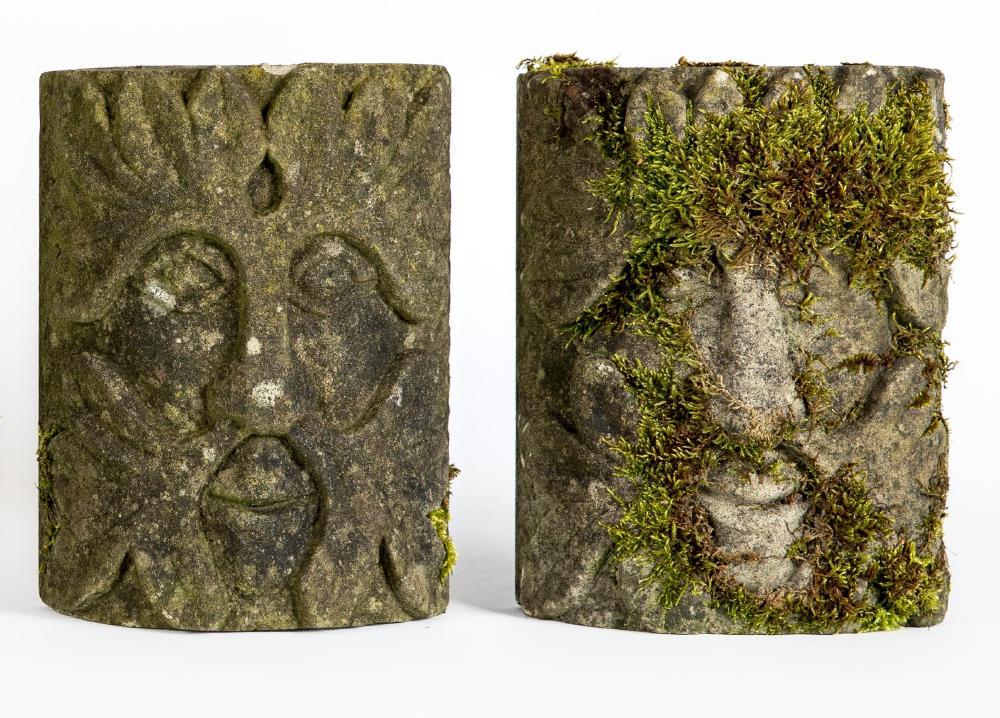 A PAIR OF CARVED SANDSTONE GREEN MAN WALL MASKS, c.1900, of bowed oblong form, realistically Image