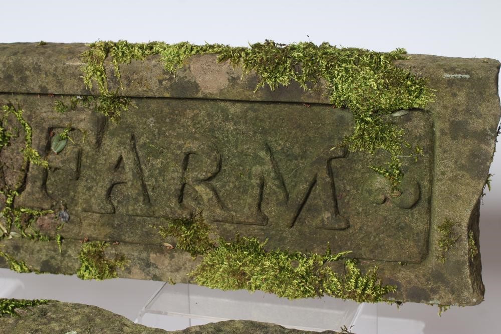 A CARVED SANDSTONE HOUSE NAME PLATE Image