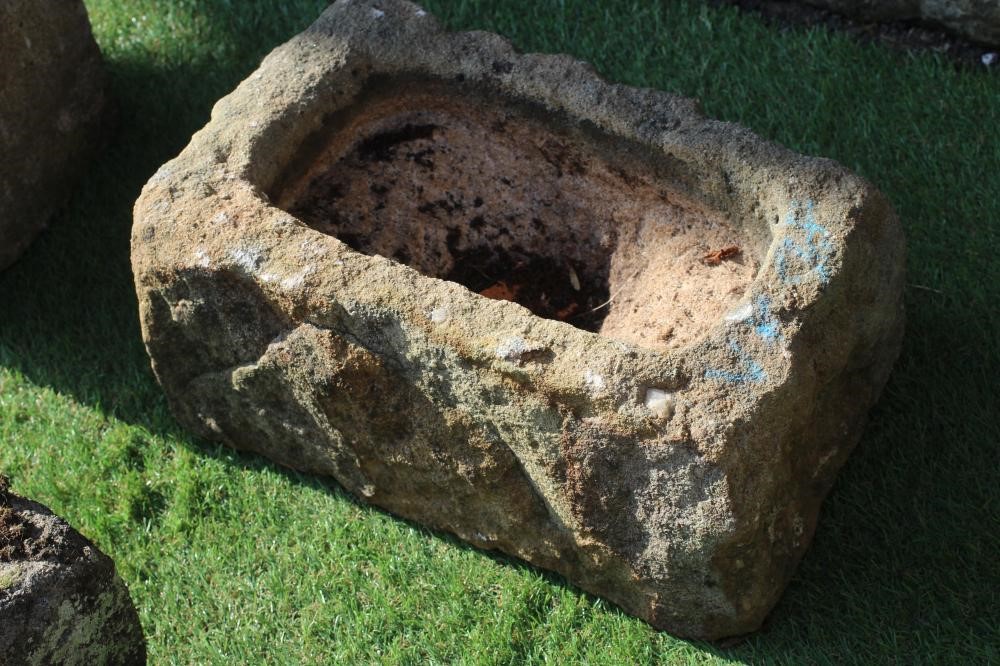 A SMALL SANDSTONE TROUGH, oblong, 15" x 10" x 7", together with two others, similar (3) (Est. plus Image