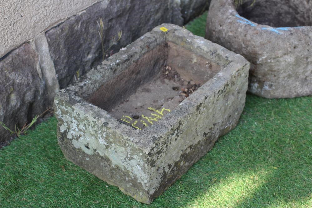 A SMALL SANDSTONE TROUGH, oblong, 21" X 10" X 6", together with another, 13 1/2" x 14 1/2" x 5 1/2", Image