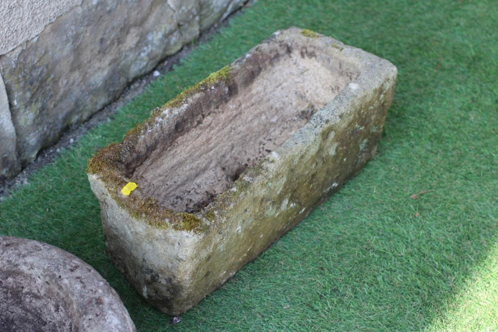 A SMALL SANDSTONE TROUGH, oblong, 21" X 10" X 6", together with another, 13 1/2" x 14 1/2" x 5 1/2", Image