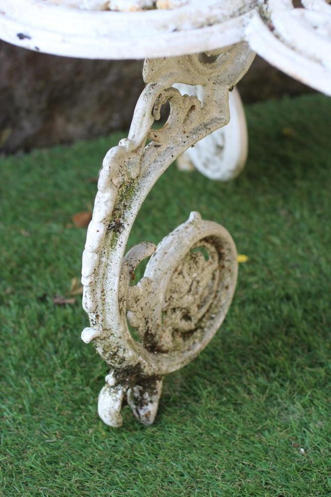 A VICTORIAN CAST IRON CONSERVATORY PLANT STAND of lobed two tier form pierced and moulded with Image