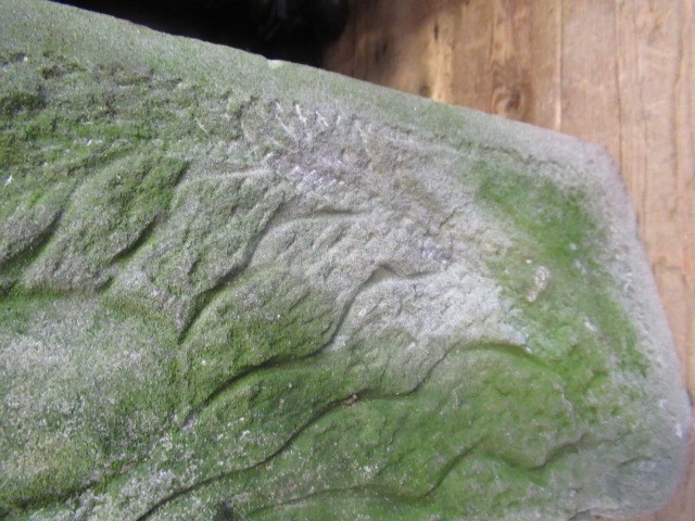 A CARVED SANDSTONE GREEN MAN MASK CORNER STONE, 10 1/4" X 17" (Illustrated) (Est. plus 24% premium Image