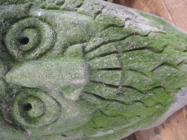 A CARVED SANDSTONE GREEN MAN MASK CORNER STONE, 10 1/4" X 17" (Illustrated) (Est. plus 24% premium Image
