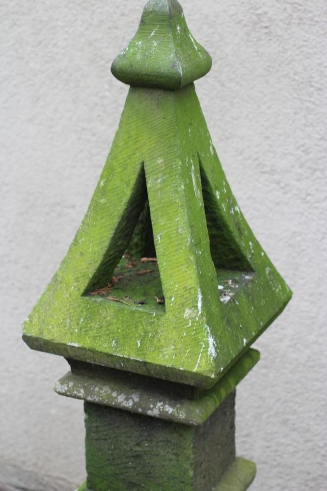A SANDSTONE FINIAL of square form, the pierced tapering surmount with ogee finial, on ogee moulded Image