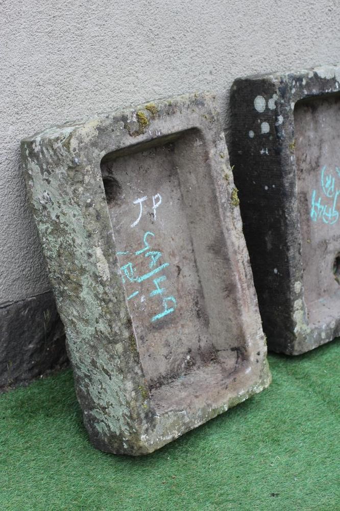 A MATCHED PAIR OF SANDSTONE TROUGHS of shallow, well cut oblong form, 27 1/2" x 18 1/2" x 6 1/2" Image