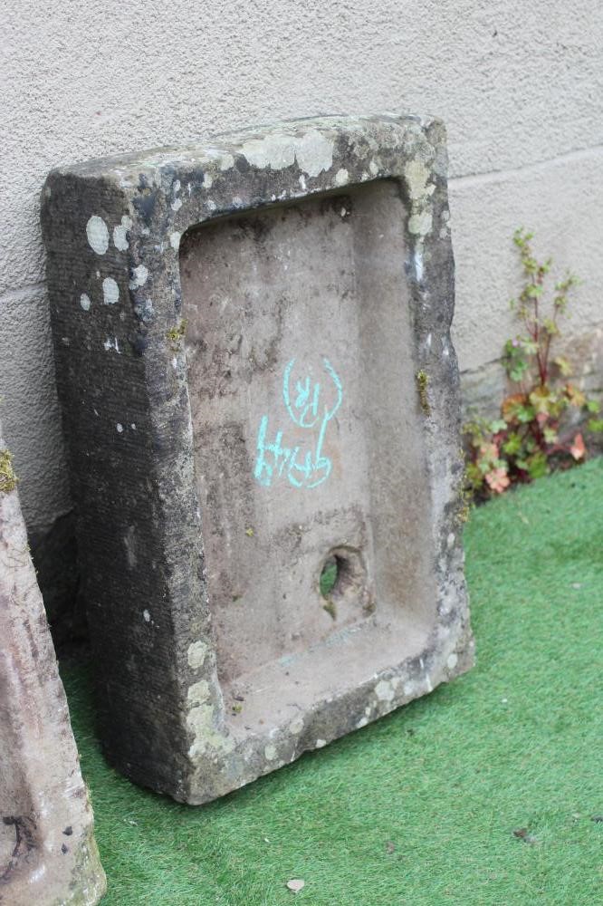 A MATCHED PAIR OF SANDSTONE TROUGHS of shallow, well cut oblong form, 27 1/2" x 18 1/2" x 6 1/2" Image