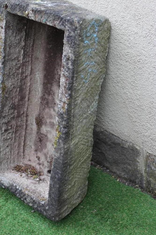 A SANDSTONE TROUGH of well cut oblong form with tapering sides, 33" x 17 1/2" x 10" (Est. plus 24% Image