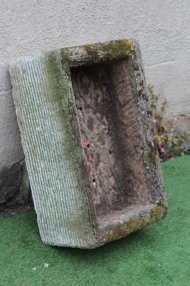 A SANDSTONE TROUGH of well cut oblong form with line banding, 27 1/2" x 17" x 11" (Est. plus 24% Image