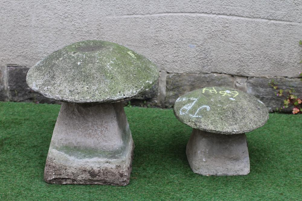 A CAST STONE MUSHROOM on square tapering base, 21 1/2" x 23", together with a similar smaller item, Image