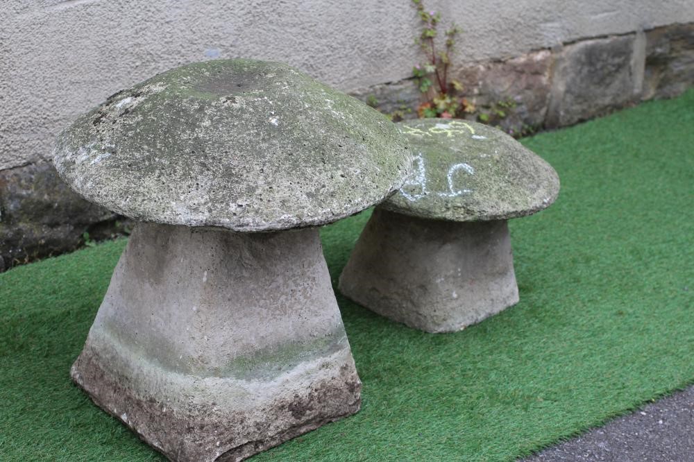 A CAST STONE MUSHROOM on square tapering base, 21 1/2" x 23", together with a similar smaller item, Image