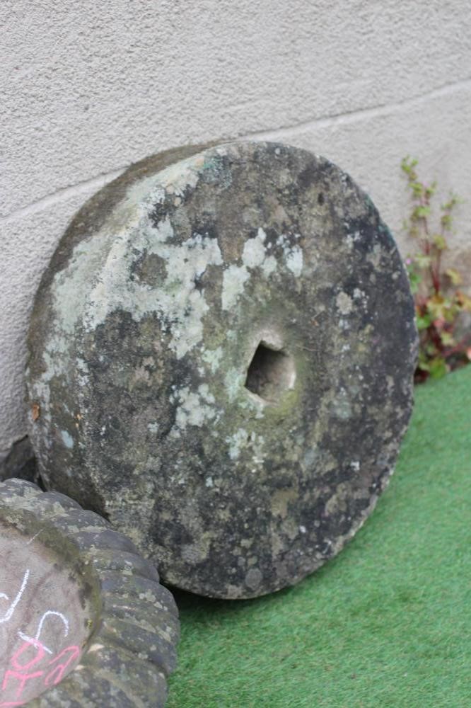A SMALL SANDSTONE FOUNTAIN, the bowl with everted ovolu moulded rim, on moulded circular base, 21" x Image