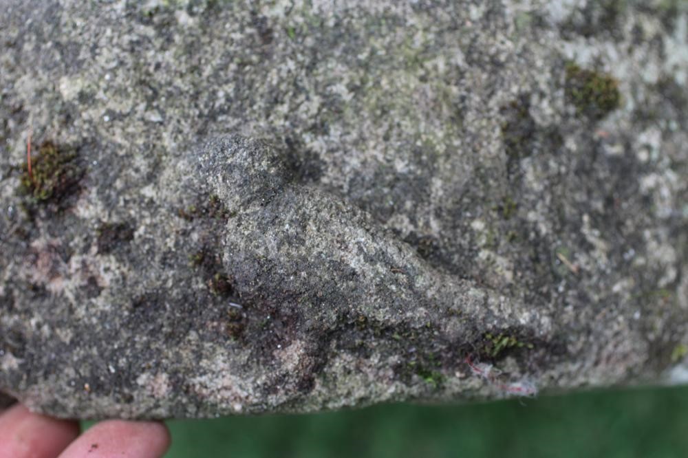 A SMALL SANDSTONE BIRD BATH, the circular bowl with carved bird to rim, 13 1/2" x 4", together with Image