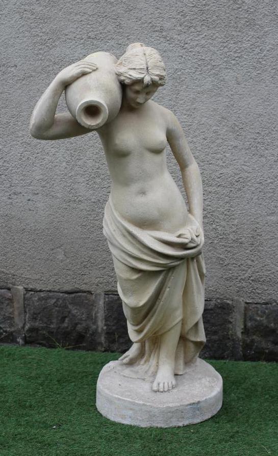 A CAST STONE FIGURE OF A YOUNG MAIDEN modelled semi-nude and holding a water vessel on her shoulder, Image