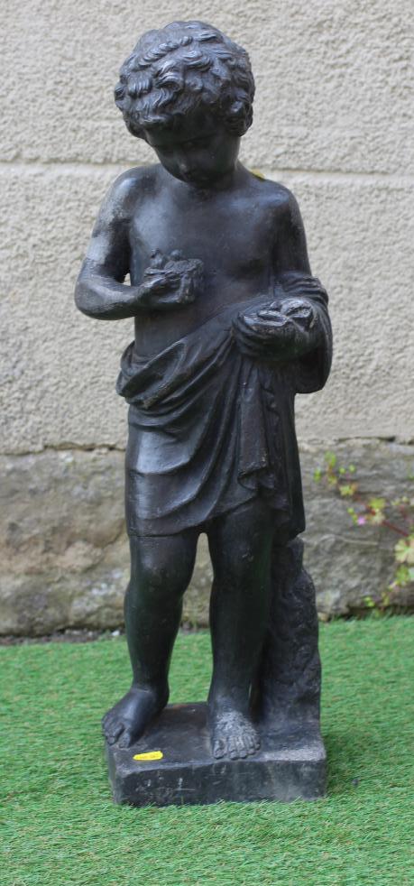 A VICTORIAN LEAD FIGURE OF A PUTTO modelled standing and holding a bird's nest, on square base, 7 Image