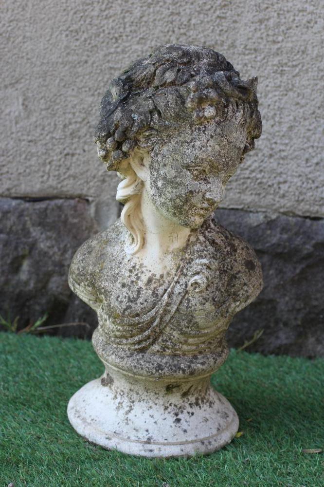 A CAST STONE ALLEGORICAL BUST OF A YOUNG WOMAN representing Summer with fruiting branches in her Image