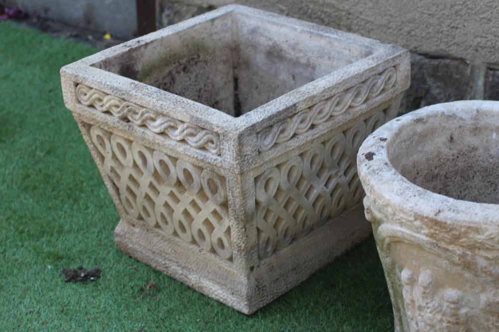 A PAIR OF CAST STONE PLANTERS of circular tapering form Image