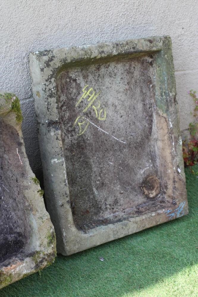 A SANDSTONE TROUGH of rough hewn oblong form, 23 1/2 x 16 1/2 x 10", together with a sandstone sink, Image