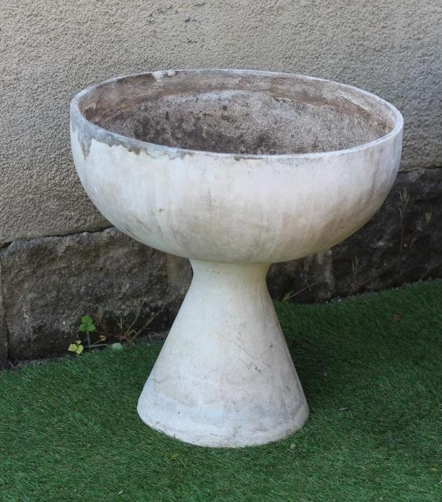 A SET OF FOUR COMPOSITION GOBLET SHAPED PLANTERS Image