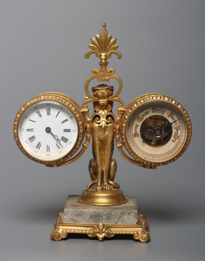 A GILT METAL FIGURAL DESK COMPENDIUM Image