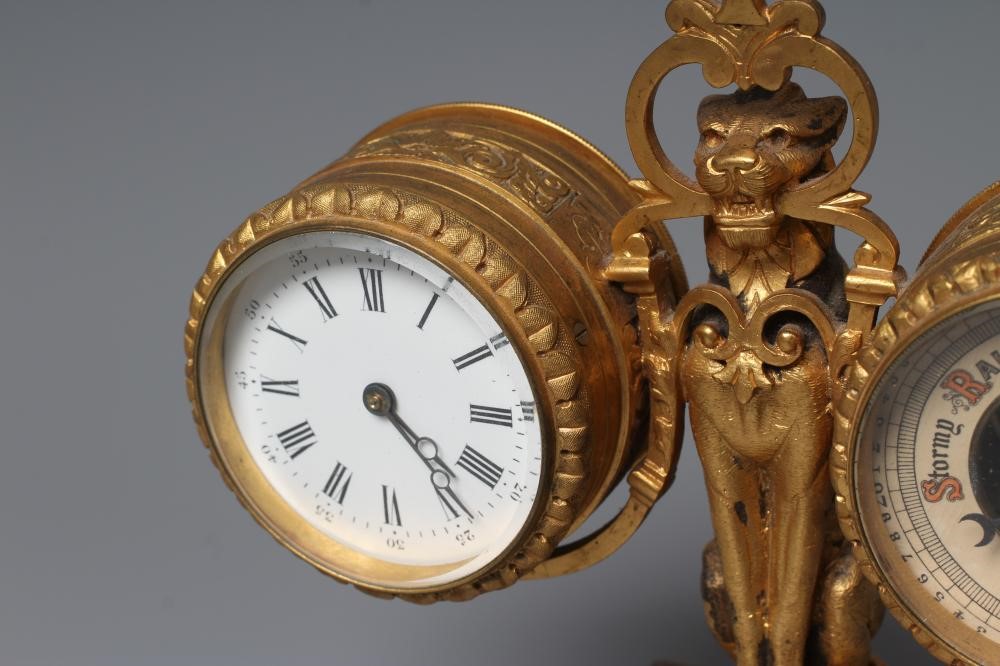 A GILT METAL FIGURAL DESK COMPENDIUM Image