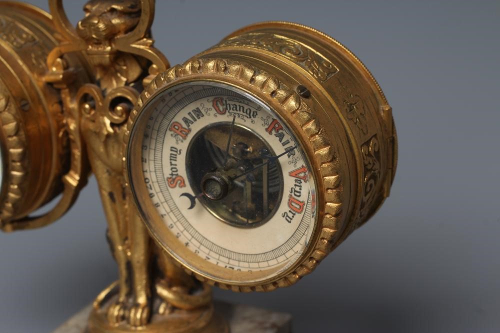 A GILT METAL FIGURAL DESK COMPENDIUM Image