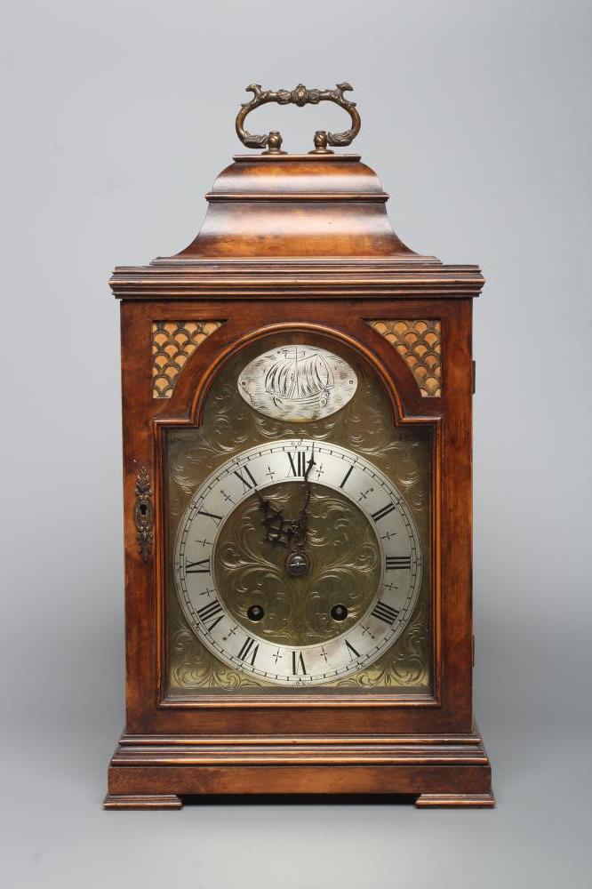 A WALNUT CASED BRACKET CLOCK Image