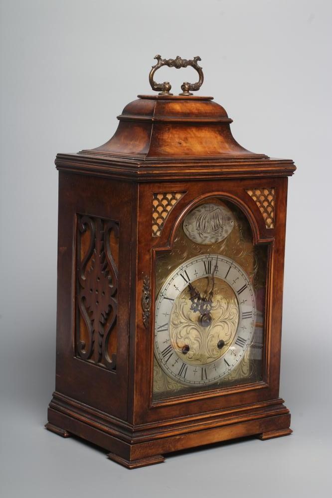 A WALNUT CASED BRACKET CLOCK Image