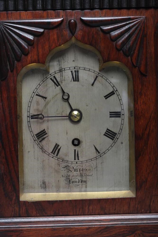 A GEORGE IV ROSEWOOD BRACKET CLOCK by Purvis Image