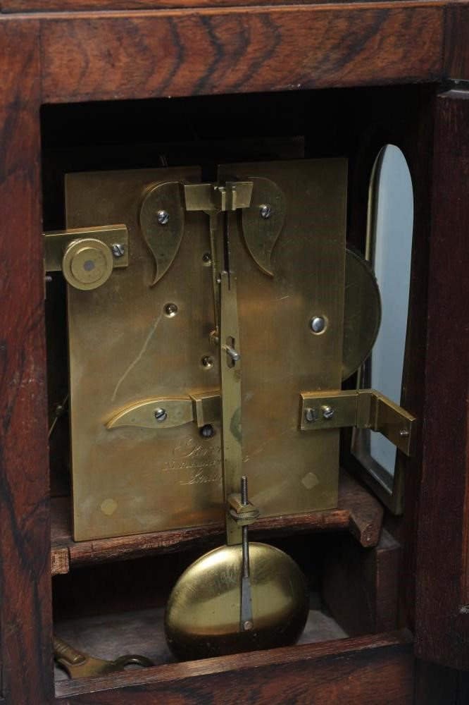 A GEORGE IV ROSEWOOD BRACKET CLOCK by Purvis Image