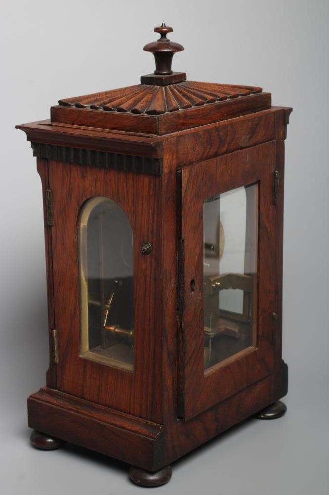 A GEORGE IV ROSEWOOD BRACKET CLOCK by Purvis Image