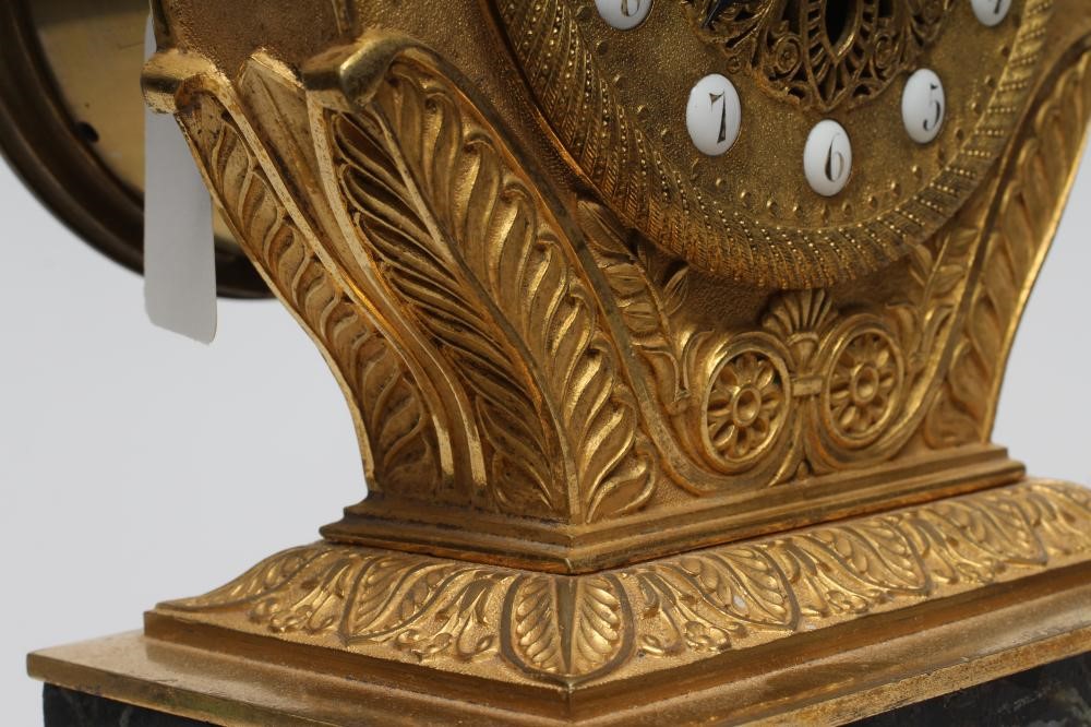 A LOUIS XVI STYLE GILT METAL LYRE MANTEL CLOCK Image