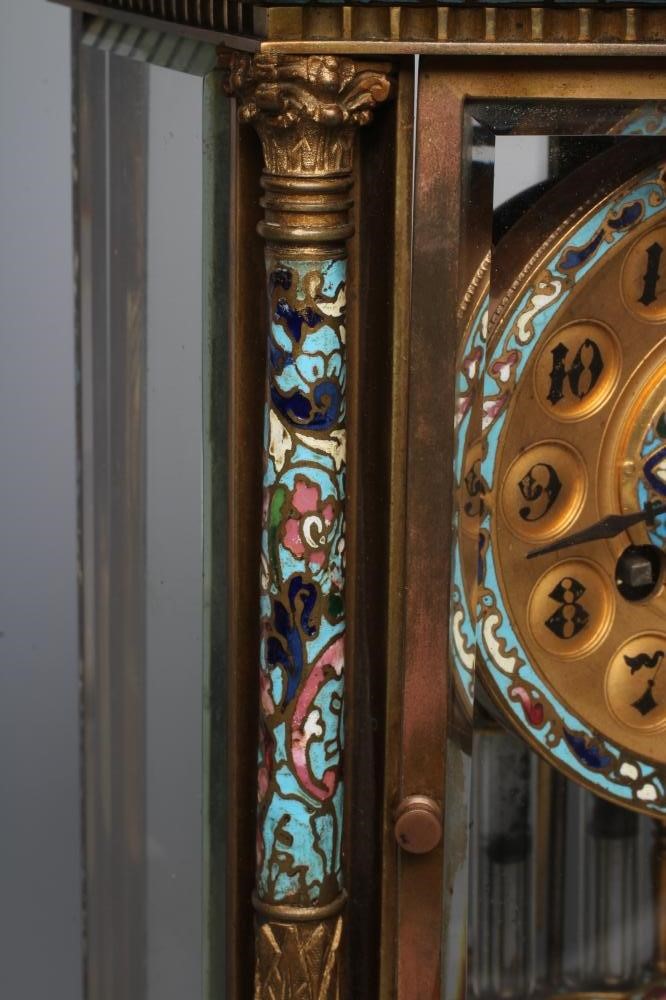 A FRENCH GREEN ONYX AND CHAMPLEVE ENAMEL FOUR GLASS MANTEL CLOCK Image