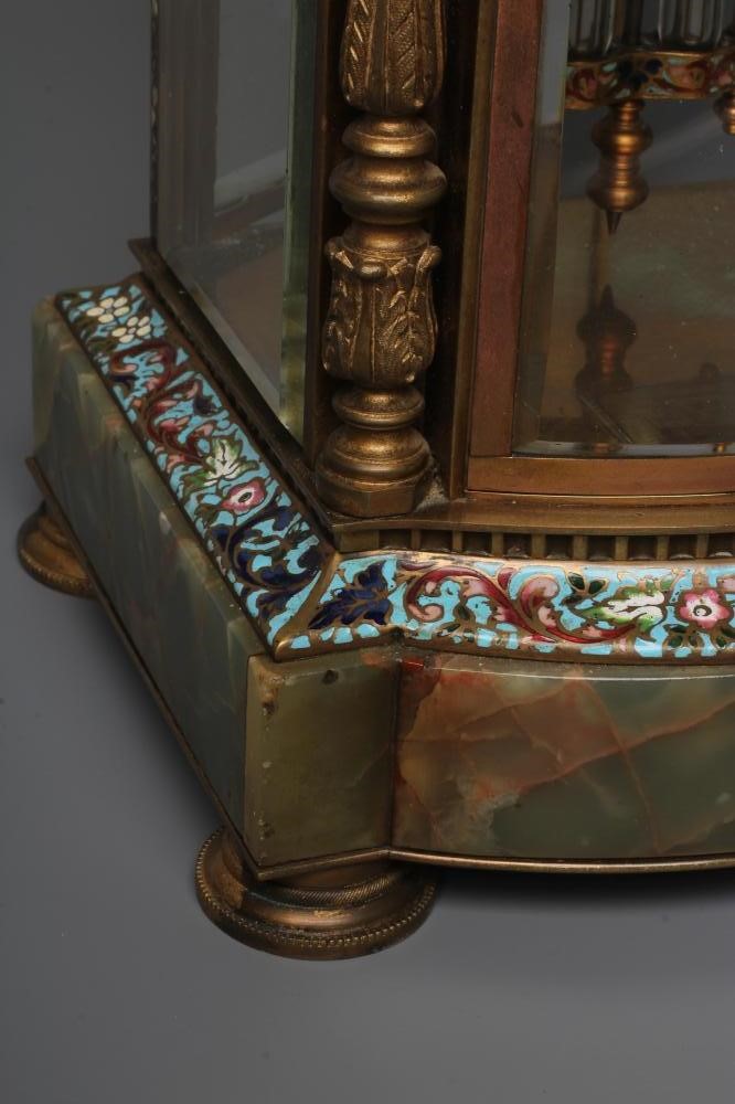 A FRENCH GREEN ONYX AND CHAMPLEVE ENAMEL FOUR GLASS MANTEL CLOCK Image
