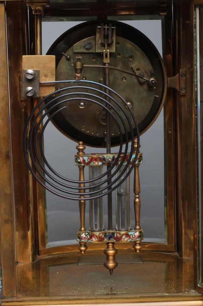 A FRENCH GREEN ONYX AND CHAMPLEVE ENAMEL FOUR GLASS MANTEL CLOCK Image