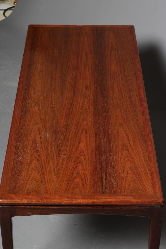 A SCANDINAVIAN DESIGN FORMOSA TEAK COFFEE TABLE, mid 20th century, the oblong top with recessed Image