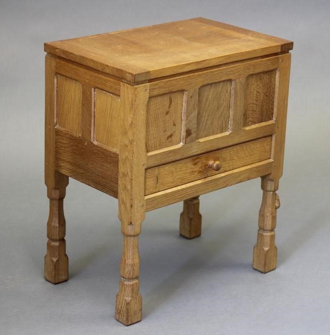 A ROBERT THOMPSON ADZED OAK WORKBOX of oblong panelled form Image