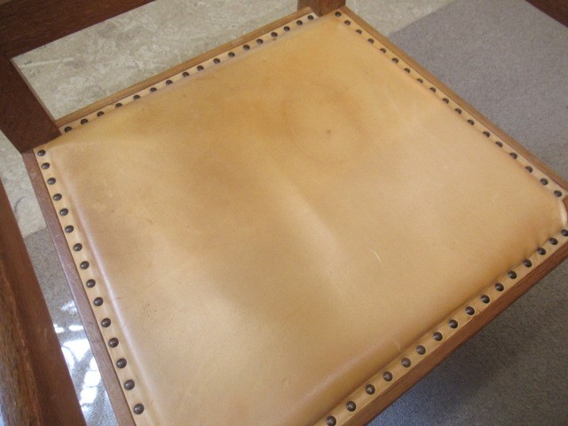 A ROBERT THOMPSON SET OF SIX OAK DINING CHAIRS including two elbow chairs Image