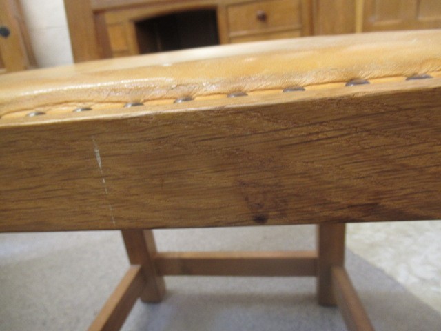 A ROBERT THOMPSON SET OF SIX OAK DINING CHAIRS including two elbow chairs Image