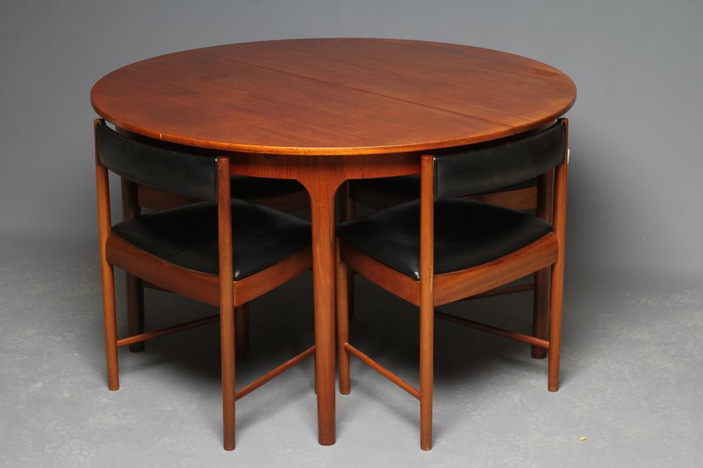 A McINTOSH TEAK DINING TABLE AND CHAIRS Image